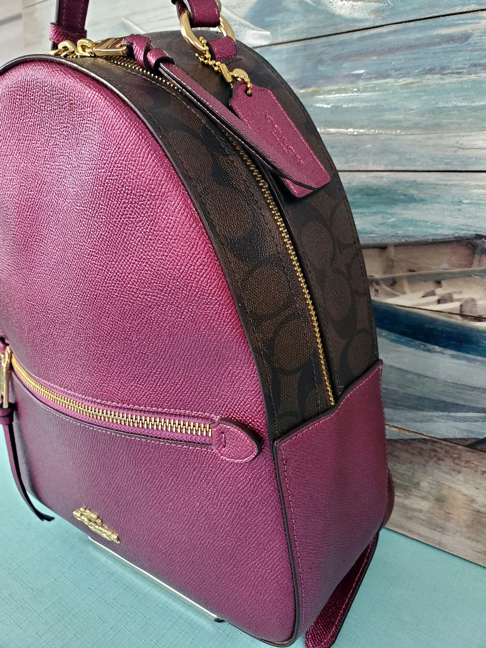 COACH JORDYN BACKPACK IN SIGNATURE CANVAS METALLIC BERRY/BROWN